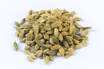 Heap of cardamom pods  (Elettaria cardamomum) isolated on white beckground