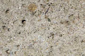 Natural conglomerate rock used as a block in construction industry