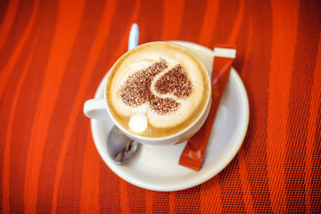 cup of cappuccino, cup of coffee on red table
