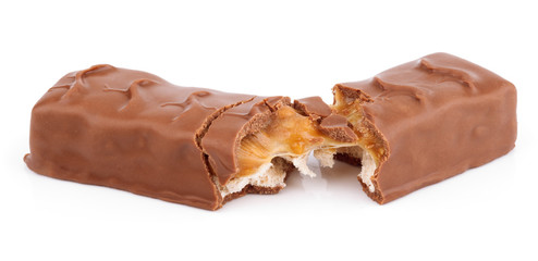 Closeup of broken chocolate bar (nougat topped with caramel, enrobed in milk chocolate) isolated on...
