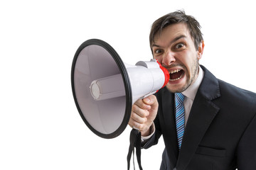 Young man is announcing a message and shouting to megaphone. Isolated on white background.
