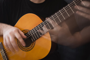 Fototapeta na wymiar Guitarist Hand Playing