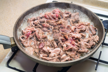 Meat roasted on frying pan