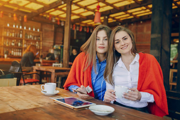 two girls in a cafe