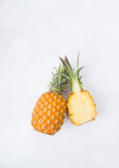 Pineapple on a  light background. Exotic fruits. Copyspace