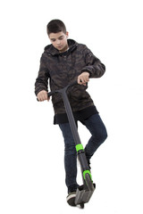 child on scooter isolated on white background