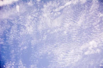 Fluffy clouds in a blue sky sunny day