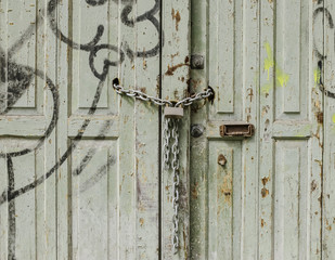 Door with chain and padlock
