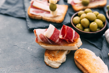 Jamon Slices of Bread with Spanish Serrano Ham Served as Tapas