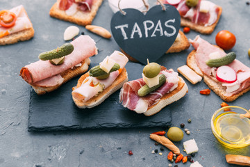 Spanish tapas with slices jamon serrano