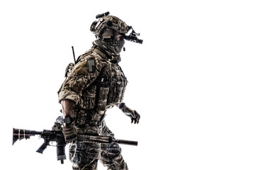 Army Ranger in field Uniforms with weapon, plate carrier and combat helmet are on, his face closed...