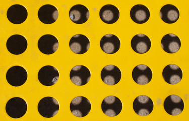 Yellow steel surface with shadow