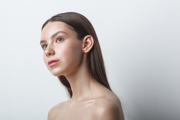 beauty woman head and shoulders portrait, clear shiny skin