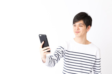Fototapeta premium portrait of young asian man isolated on white background