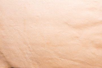 Texture of old shabby and crumpled paper, vintage style, abstract close-up background