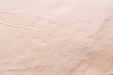 Texture of old shabby and crumpled paper, vintage style, abstract close-up background