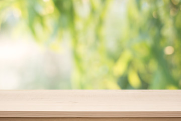 table top on green blurred  background,Space for placing products