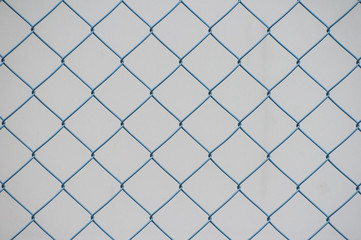 Fototapeta premium background of iron chain net fence in black and white