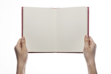 woman hand hold a red book isolated white.