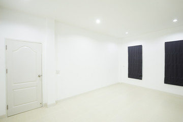 empty white room with door and window