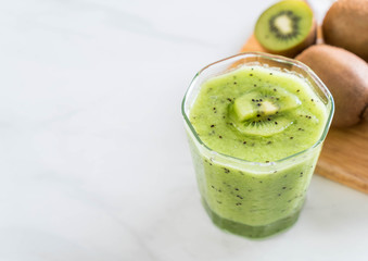 Healthy fresh kiwi smoothie in glass