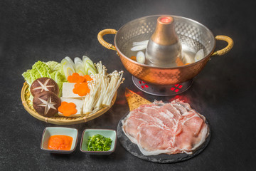 Fototapeta na wymiar ぶた肉のしゃぶしゃぶ　Shabu-shabu Japanese food of the pork