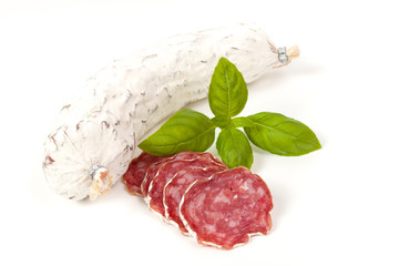 Salami sliced on the white background