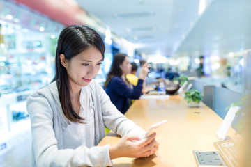 Woman use of mobile phone