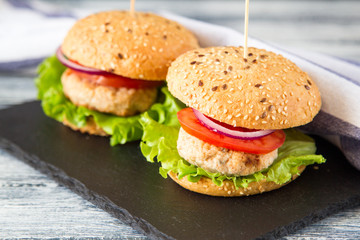 Homemade healthy Turkey Burger with Lettuce and Tomato. selective focus
