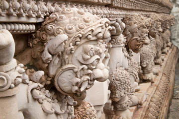 Giant stucco statue on the temple wall