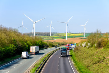 Day view UK Motorway Road Wind Turbines - Powered by Adobe