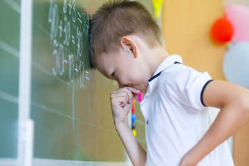 Schoolboyl at the blackboard