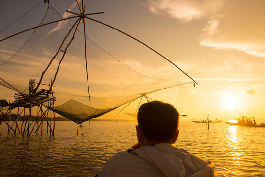 Travel by boat to sightseeing traditional fishing in lake at Pakpra, Phatthalung province, Thailand.
