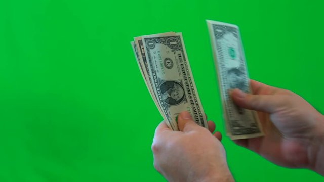 Mans Hands Closeup, Counting United States Money, Against Green Screen.