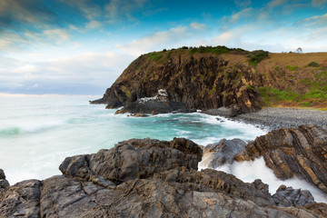Soft morning light highlights a dreamy coastal scene on the eastern coast of Australia.