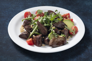 Warm salad from turkey liver