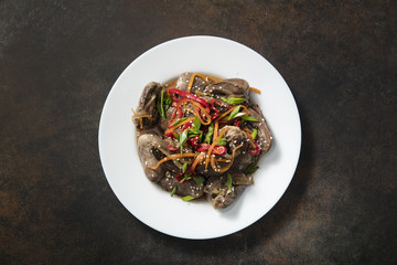 Warm salad from turkey hearts