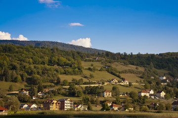 Fototapeta na wymiar idyllic landscape with a small village