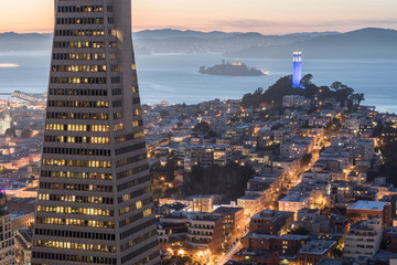 Dusk over Telegraph Hill, Alcatraz Island and San Francisco Bay from the Financial District. San Francisco, California, USA.