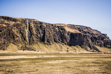 Waterfall and countryside in Iceland