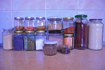 Jars with spices in the kitchen