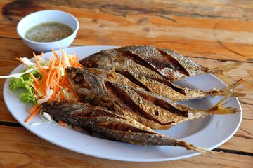Fried mackarel with fish sauce / Menu of the Mackerel fish fried with fish sauce on a plate and serve