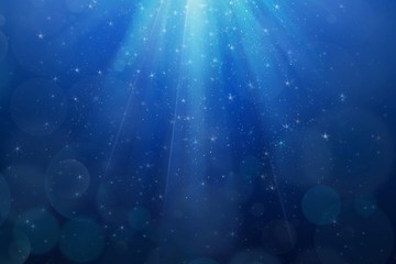 Abstract magic blue background with bokeh lights