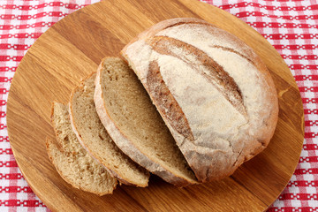 freshly baked bread on wood background