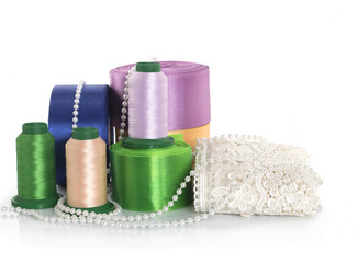 Satin ribbons, silk threads and gold braid. Everything for sewing and needlework
