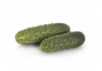 Real green cucumbers on a white background. Isolated