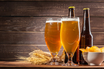 Glass of beer and beer bottle