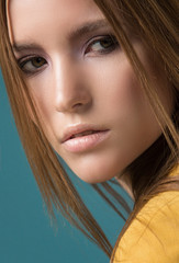 Naklejka premium Portrait of a girl model in the studio. Fashion, style, beauty.