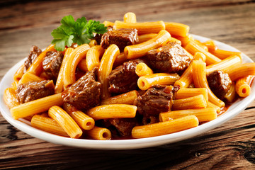 Speciality Italian cuisine with rigatoni and beef