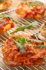 Small Pizza with mozzarella Cheese, ham and arugula